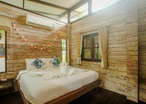 Postel nebo postele na pokoji v ubytování Amaya Boutique Resort