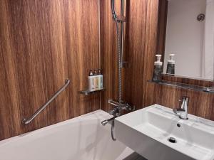 حمام في Hotel Keihan Tenmabashi Ekimae