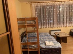 Postel nebo postele na pokoji v ubytování Apartment Zapart Studio Horní náměstí Rokytnice nad Jizerou