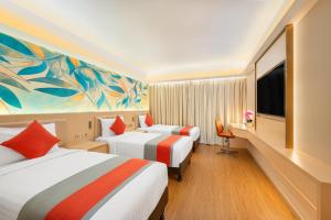 Voodi või voodid majutusasutuse Hotel Riviera Macau toas