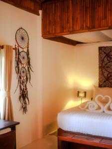 Postel nebo postele na pokoji v ubytování Amaya Boutique Resort