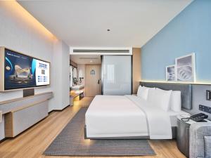 Телевізор і / або розважальний центр в Country Inn&Suites By Radisson, Xi'an Bell and Drum Tower Flagship