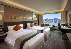 เตียงในห้องที่ InterContinental Grand Stanford Hong Kong by IHG