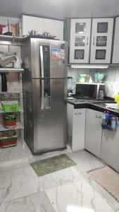 Køkken eller tekøkken på Casa Confortável , espaçosa, proximo da praia