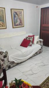 En eller flere senge i et værelse på Casa Confortável , espaçosa, proximo da praia + 31 billeder