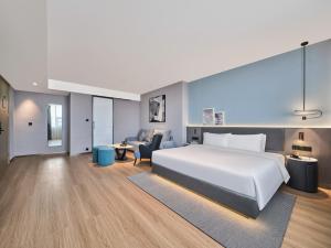 Ліжко або ліжка в номері Country Inn&Suites By Radisson, Xi'an Bell and Drum Tower Flagship