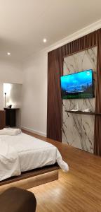 TV o dispositivi per l'intrattenimento presso villa view2 sayriah