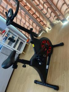 a exercise bike on the floor in a room at Sandakan Js homestay in Sandakan