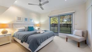 Postel nebo postele na pokoji v ubytování Watermark 5 Luxury Riverview Apartments + 12 fotografií