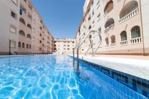 The swimming pool at or close to Cozy apartment in downtown area