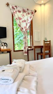 Postel nebo postele na pokoji v ubytování Pai Flora Resort