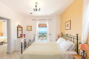 Posteľ alebo postele v izbe v ubytovaní Villa Eos by Villa Plus