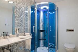 Koupelna v ubytování RuralSuite Hotel Apartamentos + 37 fotografií