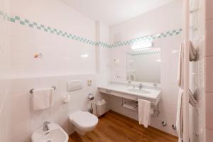 Koupelna v ubytování Hotel Figl ***S