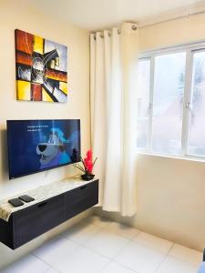 TV a/nebo společenská místnost v ubytování Baguio Condotel By GAA