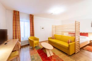 TV a/nebo společenská místnost v ubytování Hotel Figl ***S