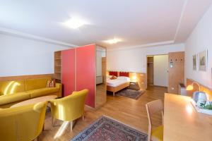 Postel nebo postele na pokoji v ubytování Hotel Figl ***S