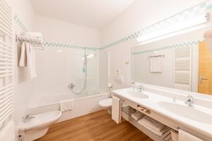 Koupelna v ubytování Hotel Figl ***S