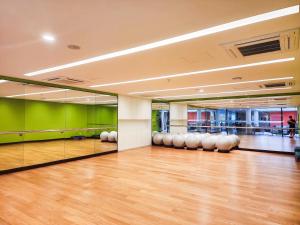 a room with a bowling alley with white balls at Ck Homestay R & F princess cove phase 2 in Johor Bahru