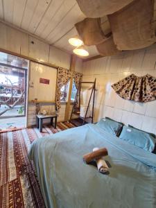 Postel nebo postele na pokoji v ubytování Nhiên Farm Homestay
