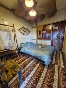 Postel nebo postele na pokoji v ubytování Nhiên Farm Homestay