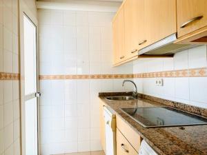 Kuchyň nebo kuchyňský kout v ubytování Home Ibiza Salou