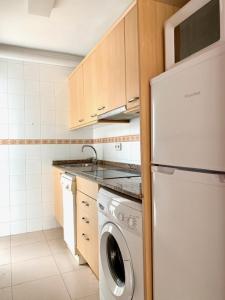 Kuchyň nebo kuchyňský kout v ubytování Home Ibiza Salou