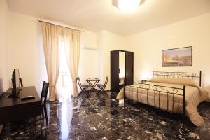 Voodi või voodid majutusasutuse B&B Tarì toas