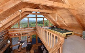an overhead view of a log cabin with a pool table at Peak A View in Sevierville