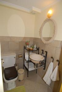 Ванна кімната в Oliviero Villas
