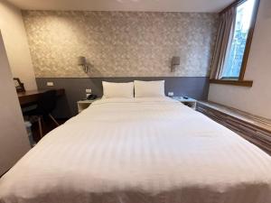 Letto o letti in una camera di 漫旅時光旅店