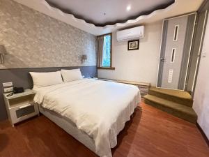 Letto o letti in una camera di 漫旅時光旅店