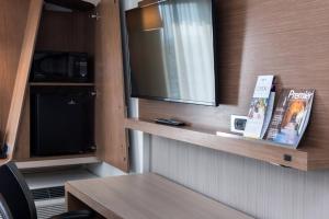 TV a/nebo společenská místnost v ubytování Courtyard by Marriott Elmira Horseheads