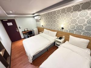 Letto o letti in una camera di 漫旅時光旅店