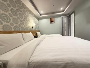Letto o letti in una camera di 漫旅時光旅店