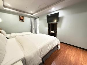 Letto o letti in una camera di 漫旅時光旅店