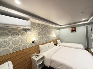 Letto o letti in una camera di 漫旅時光旅店