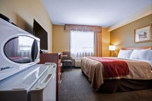 Voodi või voodid majutusasutuse Comfort Inn & Suites toas