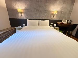 Letto o letti in una camera di 漫旅時光旅店