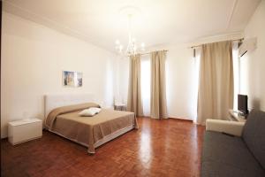 Postel nebo postele na pokoji v ubytování B&B Tarì