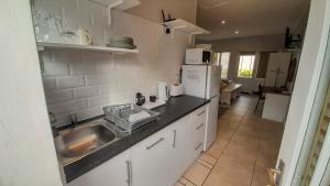 Η κουζίνα ή μικρή κουζίνα στο Seaside at The Dunes