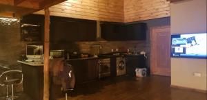 Kuchyň nebo kuchyňský kout v ubytování The Tree House + 4 fotografie