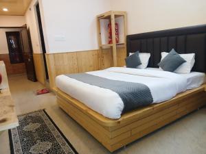 Postel nebo postele na pokoji v ubytování Hotel Cloud Height