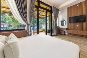 TV a/nebo společenská místnost v ubytování Phương Trinh Hotel