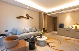 A seating area at The Mulian Hotel, Chengdu Frontier Medical Center