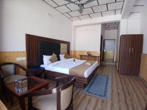 Postel nebo postele na pokoji v ubytování Hotel Cloud Height