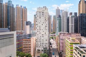 Nespecifikovaný výhled na destinaci Hongkong nebo výhled na město při pohledu z hotelu
