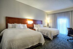 Postel nebo postele na pokoji v ubytování Courtyard by Marriott McAllen