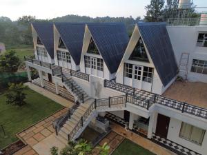 an aerial view of a house with a metal roof at The Novel Holiday Resorts in Yelagiri