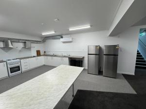 Kuchyň nebo kuchyňský kout v ubytování Backpackers Central Hamilton